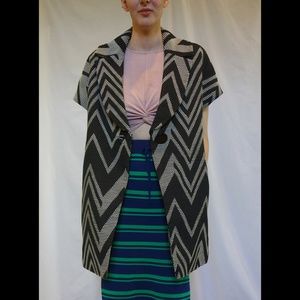 Black and white woven vest